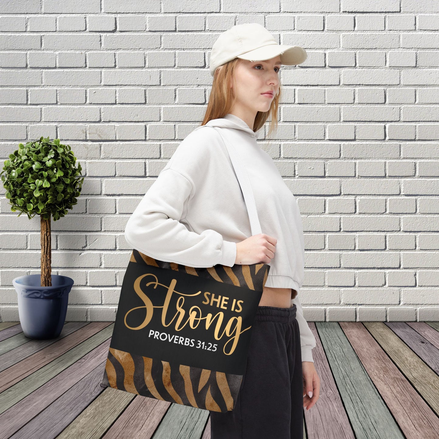 She is Strong Leopard Print Travel Bag | Inspirational Proverbs 31:25 Inspired Designer Travel Bag for Faith-Filled Living Double sided print and Everyday Encouragement